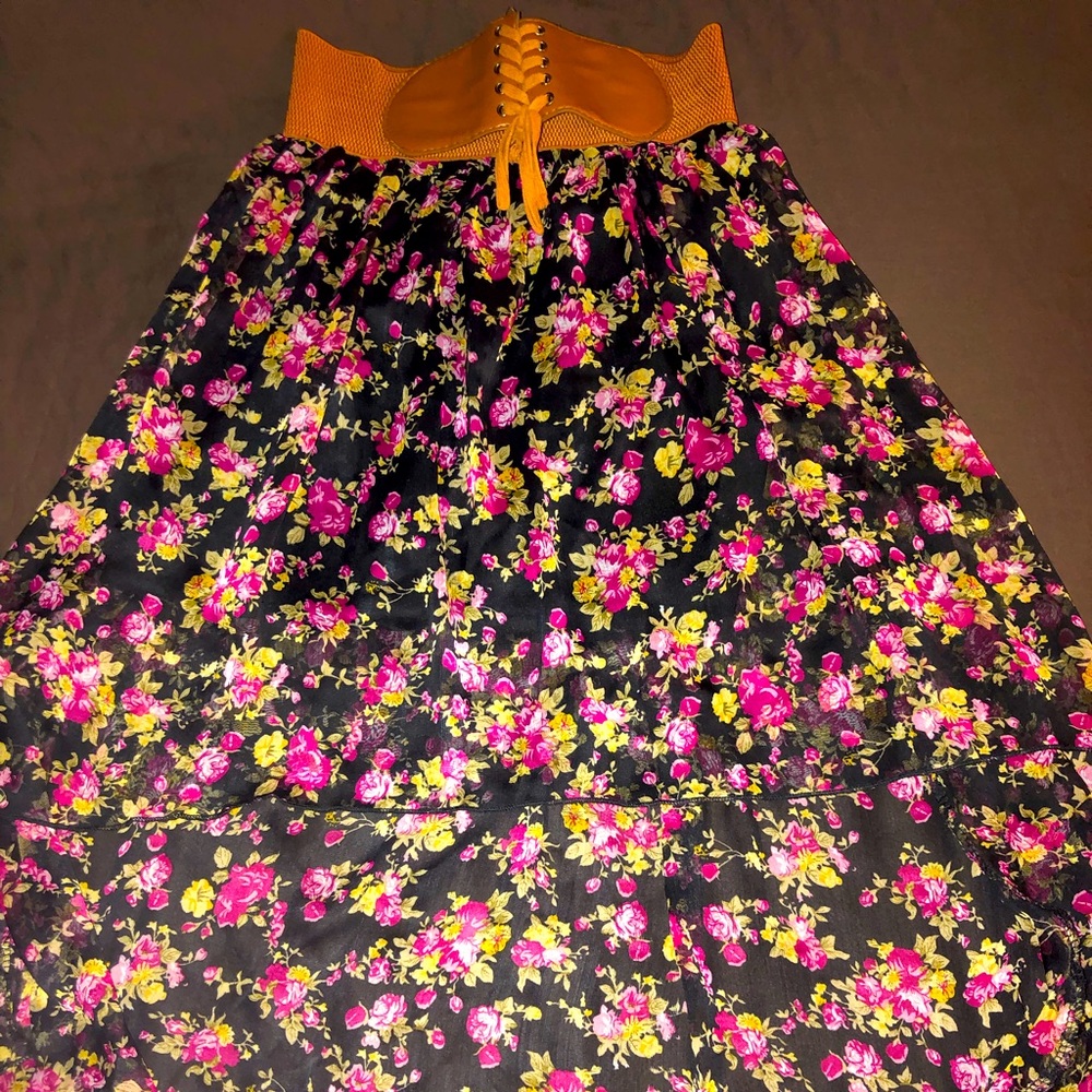 Skirts with elastic belt band and mid front design with long drop in back